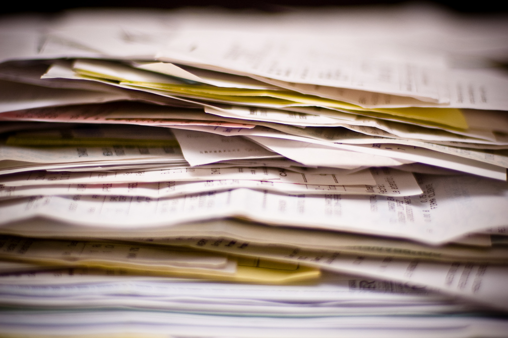 Woman charged for invoice fraud